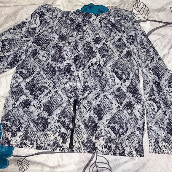 Snakeskin print rain jacket from pink - Picture 1 of 2